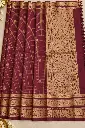 Maroon Gold Zari Silk Saree Flat Lay.webp