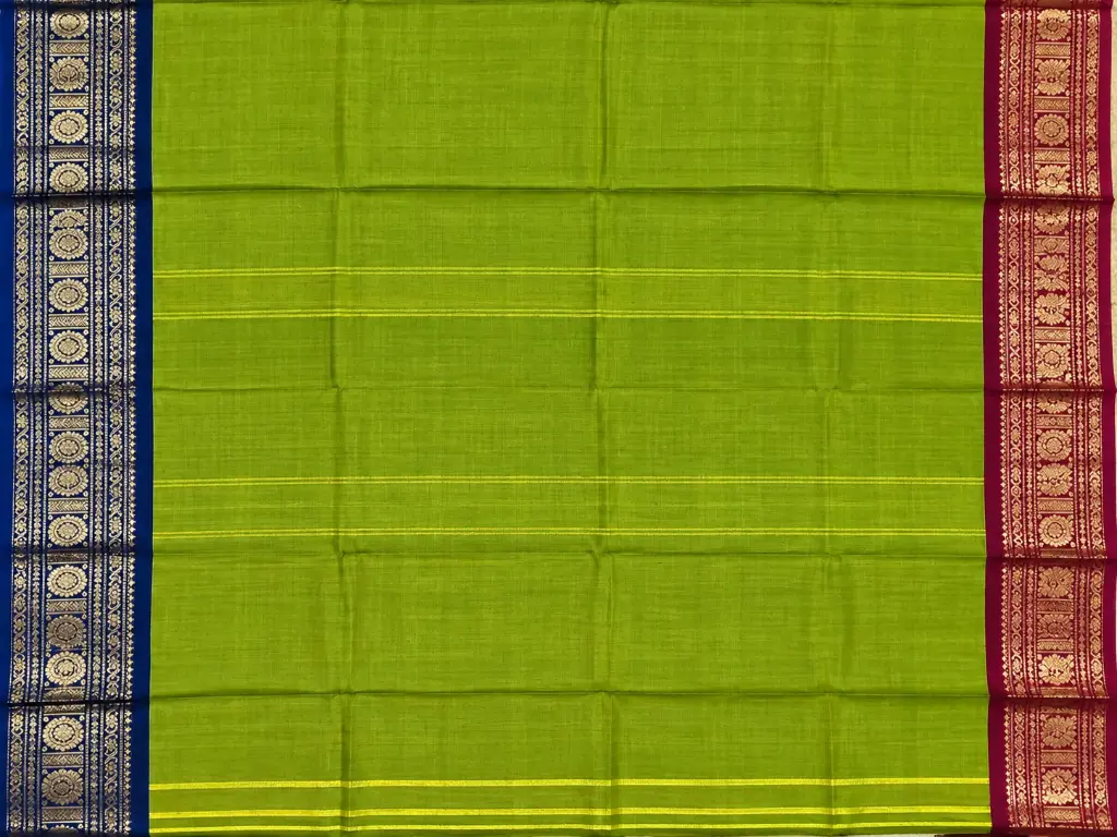 Olive Green Saree with Ornate Zari Borders.webp