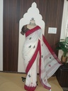 Ivory & Crimson Handloom Saree – Traditional Cotton Saree with Ethnic Fish Hand Work
